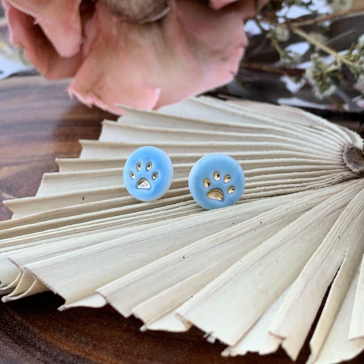 WOLF & CLAY Earrings Light Blue Paw Print in Gold Porcelain Stud Earrings
